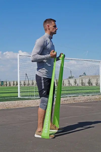 Стрічка-еспандер для фітнесу та реабілітації PowerPlay 4112 0.5мм MediBand Medium Зелена (9кг) купити недорого в Україні, фото 8