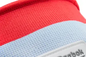 Фіксатор ліктя Reebok Speedwick Elbow Support білий, червоний Уні L купити